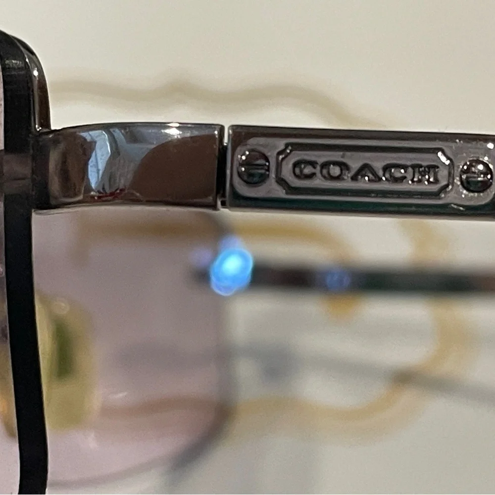 Coach Gold and Gray Sunglasses Rimless Design